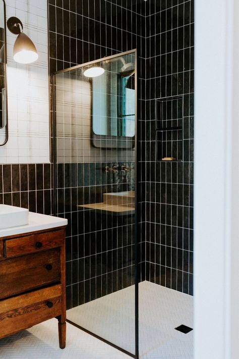 Black Subway Tile Shower Wall, Black Glass Tile Bathroom, Black Vertical Subway Tile Bathroom, Bathroom Black Floor White Walls, Bathroom Black Tile Wall, Black Tile White Tub, Black Tile Shower Bathroom, Black Tile Walk In Shower Ideas, Black Tile Shower Wall