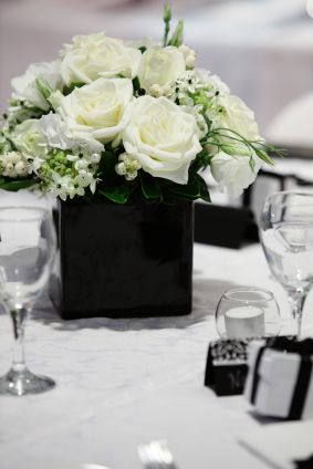 Perfect for a black and white wedding - on a damask runner reception wedding flowers,  wedding decor, wedding flower centerpiece, wedding flower arrangement, add pic source on comment and we will update it. www.myfloweraffair.com can create this beautiful wedding flower look. Black Vase With Flowers Centerpieces, Black Vase Flower Arrangement, Black And White Flower Centerpieces, Black And White Wedding Centerpieces, Black Vase Centerpiece, Swim Banquet, Black And White Centerpieces, White Marquee, Black Vases