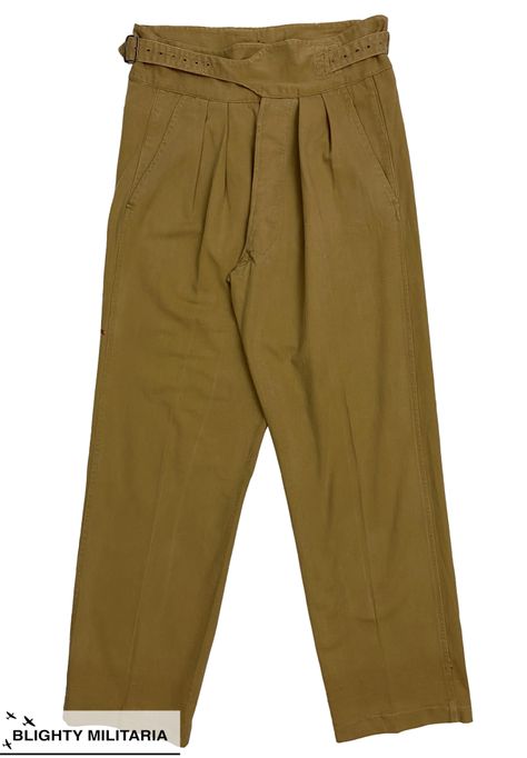 An original pair of British 1950s Pattern Khaki Drill Trousers in a size 31x31 - Available now at www.blightymilitaria.com #gurkhapants #gurkhatrousers #gurkhashorts #1950pattern #khakidrill #vintagemilitarypants #vintagemilitarytrousers #vintagemilitaryclothing #vintagemilitary #vintagemilitarywear #vintagemilitaria #vintageshowroom #vintagearchive #furugi #vintagemenswear #vintage1950s #1950sfashion #vintageclothing #vintageclothingforsale #blightymilitaria 1950s Patterns, 1950’s Fashion, Military Pants, Vintage Military, Vintage 1950s, Harem Pants, Khaki Pants, Vintage Outfits, Trousers