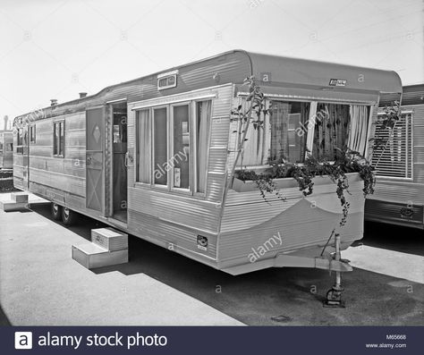 Download this stock image: 1950s MOBILE HOME IN TRAILER PARK - by007177 CAM001 HARS OLD FASHIONED - M65668 from Alamy's library of millions of high resolution stock photos, illustrations and vectors. Vintage Trailers For Sale, Moble Homes, Vintage Campers, Trailer Home, Vintage Trailers, Mobile Homes, Trailer Park, Trailers For Sale, Vintage Camper