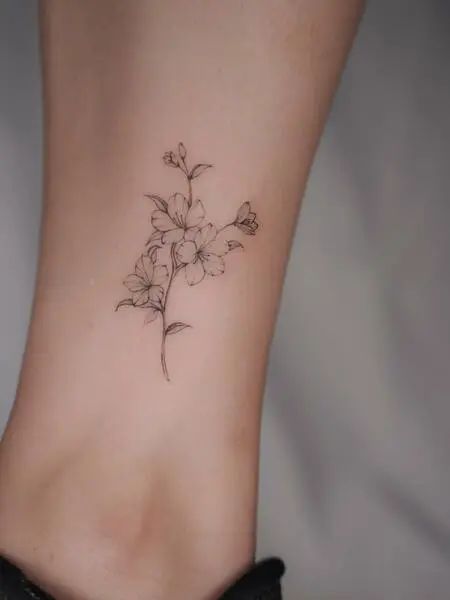 Simple Cherry Blossom Tattoo Rib Tree Tattoos For Women, White Cherry Blossom Tattoo, Mai Flower Tattoo, Sakura Blossom Drawing, Tiny Cherry Blossom Tattoo, Cherry Blossom Ankle Tattoo, Cherry Blossom Tattoo Simple, Small Cherry Blossom Tattoo Simple, Lotus Rib Tattoo