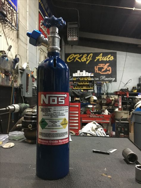 In house made custom NOS bottle piggy bank Nos Bottle, Mechanics Aesthetic, City Streets Photography, Dump Ideas, Cool Car Accessories, Gtr R34, Racing Posters, Gear Head, Car Mechanic