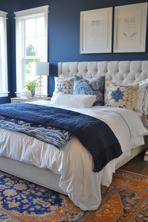 130+ Serene Coastal Bedroom Decor Ideas Blue Upholstered Headboard, Navy Blue Bedroom, Blue And Gold Bedroom, Moody Bedroom Ideas, Blue Bedroom Ideas, Navy Blue Bedrooms, Blue And White Rug, Blue Accent Walls, Coastal Bedroom Decorating