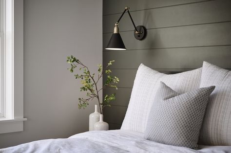 With so many ways to create an accent wall, we combined two of our favorites: a fun paint color and shiplap! We opted for horizontal shiplap in this space to give the illusion that the room was longer than it actually was so this basement guest bedroom didn't feel too cramped. By choosing a warm green tone for the paint color, it keeps the space feeling natural and calming! Grey Vertical Shiplap Wall, White Horizontal Shiplap Wall, Vertical Vs Horizontal Shiplap, Accent Wall For Bedroom, Basement Guest Bedroom, Cottage Guest Bedroom, Horizontal Shiplap, Nickle Gap Shiplap Wall Vertical, Wall For Bedroom