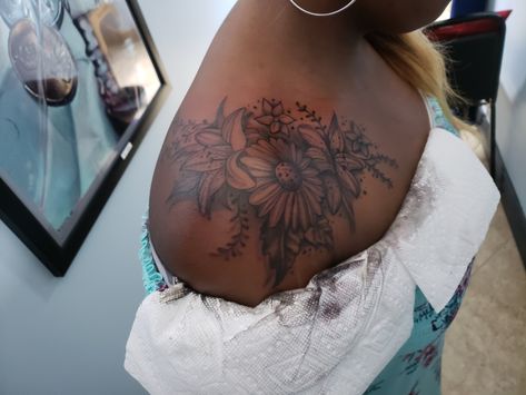 Cover Up Tattoos Black Women, Lily Chest Tattoo, Flower Shoulder Tattoo Black Women, Flower Tattoos On Black Women, African Flower Tattoo, Shoulder Tattoo Black Woman, Flower Tattoos Dark Skin, Flower Tattoos Black Women, Shoulder Tattoo Girl Black