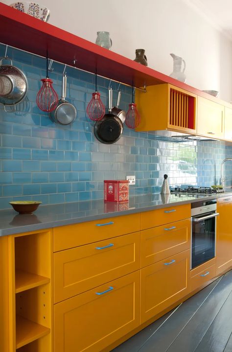 Blue And Yellow Kitchen, Blue Yellow Kitchens, Orange Cabinets, Turquoise Cabinets, Orange Kitchen Decor, Yellow Cabinets, Turquoise Kitchen, White Tile Backsplash, Blue Kitchen Cabinets