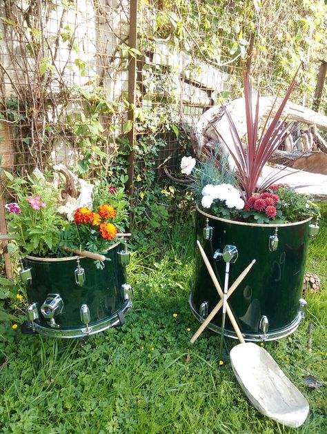 Drum planters Sauce Cabinet, Drum Planter Ideas, Manor Backyard, Maximalist Garden, Drum Planters, Drum Decor, Drum Furniture, Hanging Patio Lights, Musical Decor