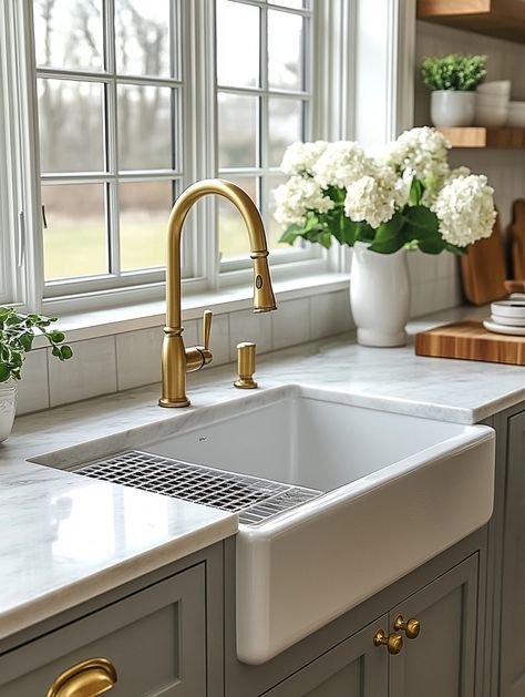 Revamp your kitchen with this elegant farmhouse sink! Its classic design pairs beautifully with modern brass fixtures, creating a stunning focal point. Perfect for the latest kitchen design trends. #kitchendecor #homedesign #modernfarmhouse Farmers Kitchen Sink, Farmers Sink Kitchen, Elegant Farmhouse Kitchen, Farmers Kitchen, Farmers Sink, Elegant Farmhouse, Latest Kitchen Designs, Farmhouse Kitchen Sink, Sink Kitchen