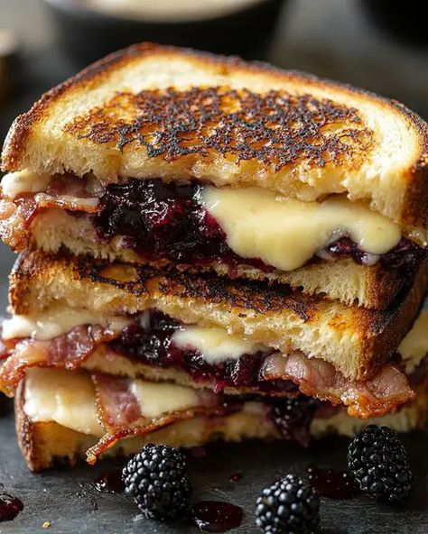 "Indulge in a gourmet twist with savory Brie, crispy bacon, and sweet blackberry jam in this irresistible grilled cheese sandwich. Perfect for a cozy meal! Savory Brie, Jam Grilled Cheese, Bacon Brie, Bacon Grilled Cheese Sandwich, Bacon Grilled Cheese, Bacon Jam, Blackberry Jam, Cozy Meals, Cheese Sandwich