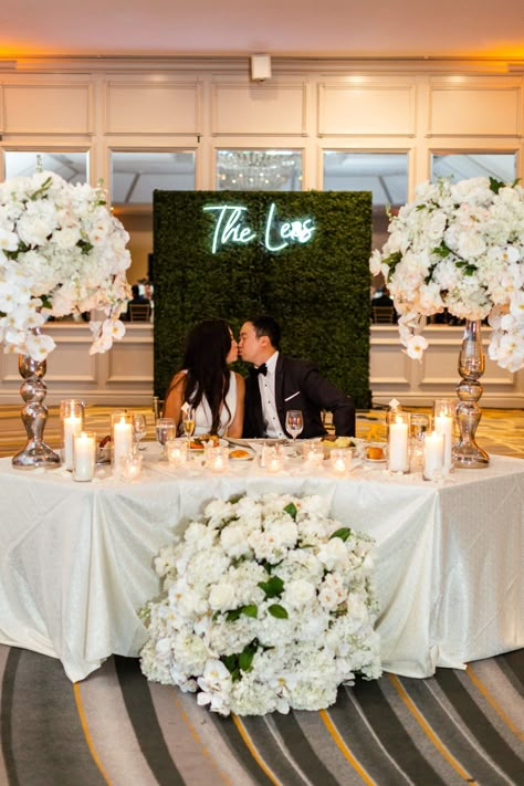 Greenery Backdrop Sweetheart Table, Couples Table Backdrop, Wedding Mr And Mrs Table Decor, Wedding Backdrop With Candles, Greenery Wedding Backdrop Receptions, Sweetheart Table Backdrops, Sweetheart Table Wedding With Neon Sign, Sweet Heart Table Flower Arrangement, Sweetheart Table Setup