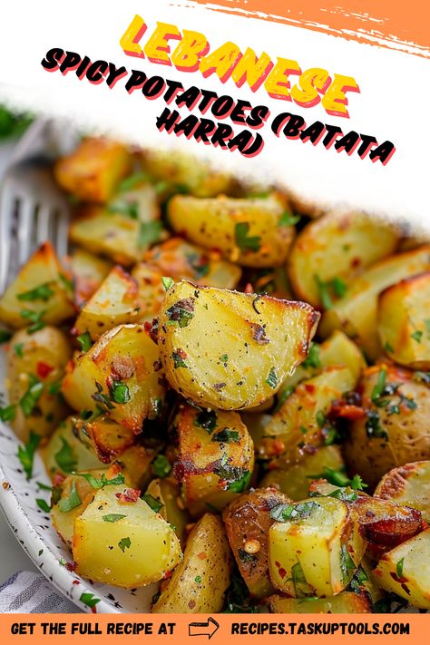 Discover the vibrant flavors of Lebanese Spicy Potatoes (Batata Harra) with this delightful recipe that brings together crispy diced potatoes, aromatic spices, and fresh herbs. Perfect as a side dish or a standalone snack, these potatoes are tossed in a zesty mix of garlic, coriander, and chili for a delicious kick. Explore the rich culinary traditions of Lebanon and impress your guests with this irresistible dish thats easy to prepare and bursting with flavor. Pin this recipe to elevate your next meal and savor Lebanese Spicy Potatoes, Crispy Diced Potatoes, Lebanese Potatoes, Batata Harra, Cilantro Garlic Sauce, Spicy Potatoes, Pakistani Dishes, Cilantro Sauce, Potato Recipes Side Dishes