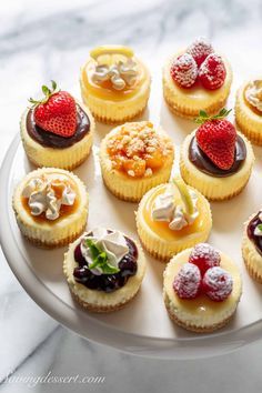 Try this easy mini cheesecake recipe for delicious, pretty individual cheesecakes. These are so much fun to decorate too! #cheesecakes #cheesecake #minicheesecakes #easycheesecake #nohotwaterbath Cheesecake Cups Recipes Easy, Mini Individual Cakes, Mini Vanilla Cheesecakes, Mini New York Cheesecake Recipes, Small Batch Mini Cheesecakes, Leftover Cheesecake Batter, Mini Raspberry Cheesecake Recipes, Thanksgiving Mini Cheesecakes, Mini Cheese Cakes Recipes Easy