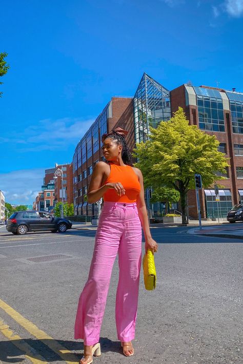 Orange top and pink trousers summer style Orange Top And Pink Pants Outfit, Neon Pink Jumpsuit, Neon Pink Pants Outfit, Pink Orange Green Outfit, Neon Orange Top Outfit, Pink And Orange Aesthetic Outfit, Orange Top Outfit Aesthetic, Bright Pink Pants Outfit, Hot Pink And Orange Outfit