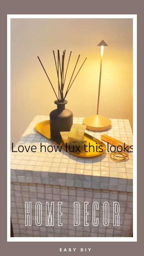 Transform an ordinary dollar store box into a chic side table with pearl tiles in this exciting DIY project! This step-by-step guide shows you how to create a luxurious piece that will enhance any room in your home. This side table is both functional and fabulous. Don’t miss out on creating this unique addition to your home.

#DIYLuxury #HomeImprovement #SideTableMakeover #PearlTiles #Crafting #CreativeLiving #HomeDecor #InteriorDesign #BudgetFriendly Tile Side Table, Easy Home Decor Diy, Chic Side Table, Pearl Tiles, Side Table Makeover, Pearl Tile, Pearls Diy, Luxury Look, Creative Living