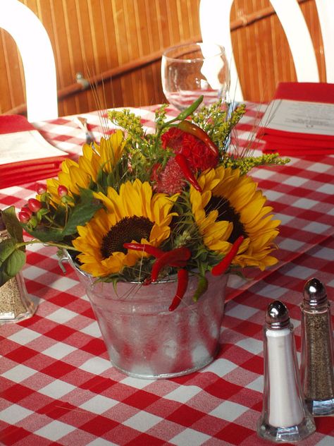 Sunflower and chili centerpiece, in galvanized bucket. Chili Cookoff Centerpieces, Chili Cook Off Centerpieces, Engagement Bbq, Cajun Party, Bbq Decor, Crab Party, Bbq Decorations, Baby Q Shower, Backyard Bbq Party