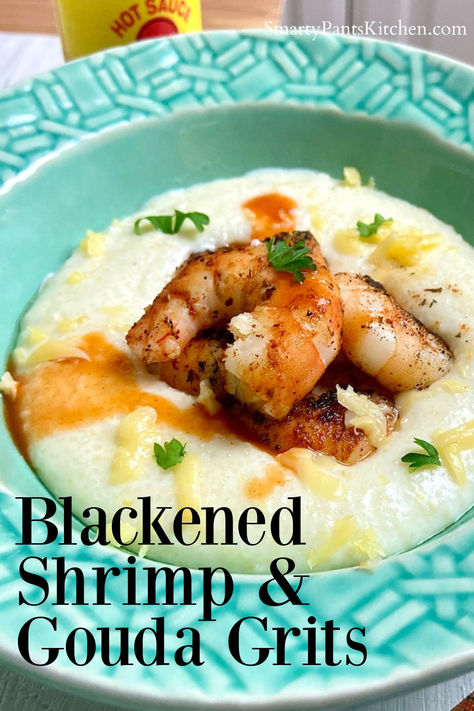 Blackened shrimp on top of cheese grits in a turquoise bowl. Shrimp Grits Recipe New Orleans, Shrimp And Gouda Grits Recipe, Blacked Shrimp, Blackened Shrimp And Grits, Shrimp And Grits Recipe Southern, Shrimp And Grits Recipe New Orleans, Gouda Grits Recipe, Homemade Grits, Smoked Gouda Grits