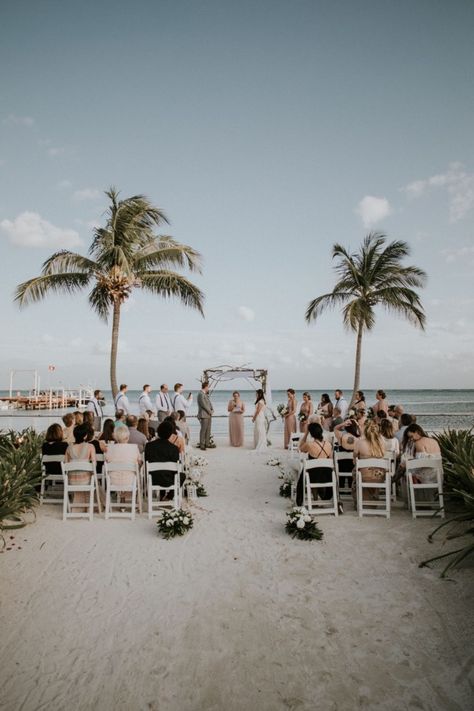 This intimate beach wedding on the shores of Grand Caribe in Belize was a stunner. The wooden wedding arch between two palms was the perfect backdrop with the sea. Not only was it beautiful, it was SO fun! I'm sure if I love coastal weddings or mountain weddings more! For more inspiration from Jen + Jake's destination wedding, head over to the blog on jacilynm.com! Their gallery is fun + beautiful, it will make you want to hop on a plane to Belize right now! Beach Wedding Drinks, Wooden Wedding Arch, Coastal Weddings, Wooden Wedding Arches, Belize Wedding, Intimate Beach Wedding, Destination Wedding Welcome Bag, Ambergris Caye, Outdoor Wedding Inspiration