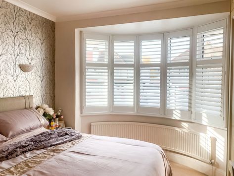 White Wood Shutters are the perfect dressing for bay windows and bedroom spaces, adding light and sound coverage with the simple tilt of the slats. Shutters On Bay Window, Wooden Shutter Blinds, White Shutter Blinds, Shutters With Curtains, Bay Window Blinds, Bay Window Shutters, Wooden Window Blinds, Conservatory Windows, White Shutters