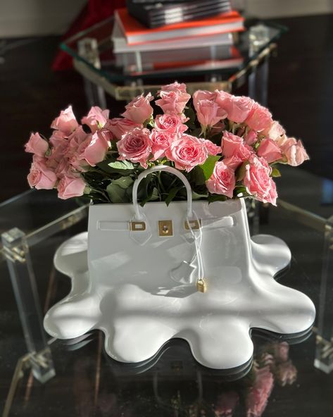 The Lola vase evokes the spirit of sophistication with its unique design that resembles a melting expensive handbag. Whether loaded with brilliant blossoms or standing alone, this vase is a statement item that exudes flair and originality. 🔍 Product: Lola Handbag Flower Vase 👆 Tap the link in bio for more unique vases! . . . . . . . . . . . . . . . . . . #interiordecor #interiorforyou #interior4you1 #interior2you #interior_design #interior4inspo #interior_and_living #interior4u #interior_de... Expensive Handbags, Unique Vases, Standing Alone, Luminous Colours, Color Pairing, Flower Vase, Interior Design Inspiration, The Spirit, Flower Vases