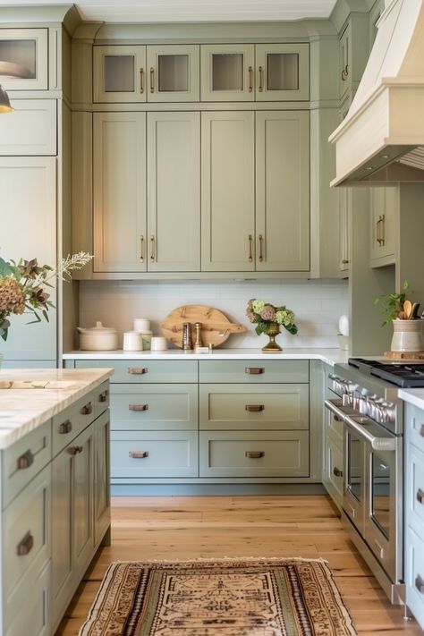 Consider a soft pastel palette if you want to add a touch of whimsy and freshness to your farmhouse kitchen. Soft pastels like mint green, baby blue, and Mint Blue Cabinets, Seafoam Green Cabinets, Light Blue Green Kitchen, Mint Kitchen Ideas, Mint Green Kitchen Ideas, Light Green Kitchen Ideas, Kitchen Light Green, Mint Kitchen Cabinets, Pale Green Kitchen Cabinets