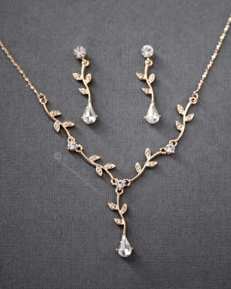 This classic and simple necklace set features a vine design with teardrop crystals. The necklace is 16 inches long with a 2.5 inch extender, the earrings are 1.5 inches long with pierced post backs. Nickel free, lead compliant, rose gold, gold, or silver plate. Matching bracelet here. Wedding Necklace Simple, Wedding Jewelry Simple, Vine Necklace, Gold Jewelry Prom, Prom Necklaces, Gold Wedding Jewelry, Gold Jewelry Sets, Prom Jewelry, Bridesmaid Jewelry Sets