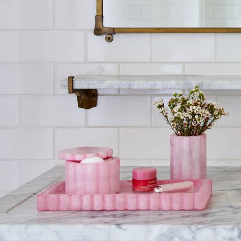 Designed in collaboration with Shopbop.Brighten up your daily routine with our Wavy Bath Accessories. The ultimate Get Ready With Me essential, this accessory set is made from dyed-pink alabaster and features scalloped details for a trendy-meets-traditional look inspired by vibrant 90s colorways and Danish Scandi style pastels. Pink Bath Accessories, Pink Beachy Bathroom, Baby Pink Room Decor, Pink Shower Aesthetic, Pastel Bathroom Decor, Anthropologie Bathroom, Trendy Bathroom Decor, Pink Bedroom Accessories, Scandi Home Decor