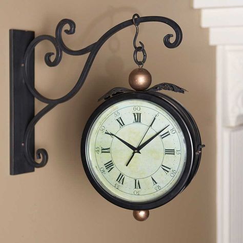 Black Iron Double Sided Hanging Clock w/Wall Bracket. Solid iron decorative wall mount and double-sided clock that hangs from it. Very impressive looking! Dimensions: The round clock face is 10"Diameter. The wall bracket is 14"High x 3"Wide and it sticks out 17.5" from the wall. Price is $45.95 Wall Grille, Colonial Home Decor, Kitchen Clock, Unusual Home, Kitchen Clocks, Primitive Colonial, Basic Kitchen, Hanging Clock, Old Clocks