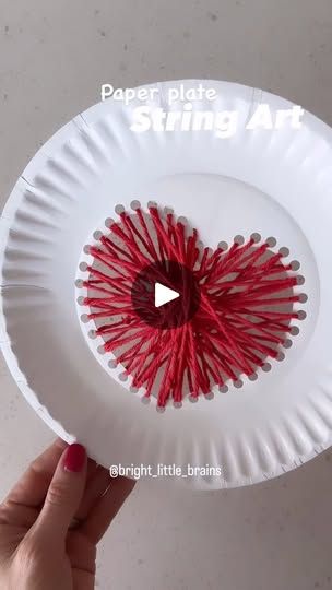 22K views · 97 reactions | This is a super easy setup activity to practice fine motor and hand eye coordination skills!🙌🏻 

All you’ll need is: 
❤️ A paper plate 
❤️ A Hole puncher 
❤️ A cutter 
❤️ String 

Best is- you can also paint the paper plate before starting to string!

#preschooler #kidsactivity #preschool #learningthroughplay #activitiesforkids #playbasedlearning #momhack #valentinescrafts #momsofinstagram #homeschool #diycrafts #kidscrafts | Bright Little Brains