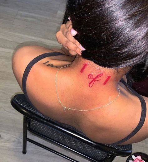 1 Of 1 Tattoo Red Ink, Red Spine Tattoo, Kneck Tattoos, Sis Tattoo, 1 Of 1 Tattoo, Back Of Neck Tattoos For Women, Butterfly Back Tattoo, Word Tattoo, Red Tattoo