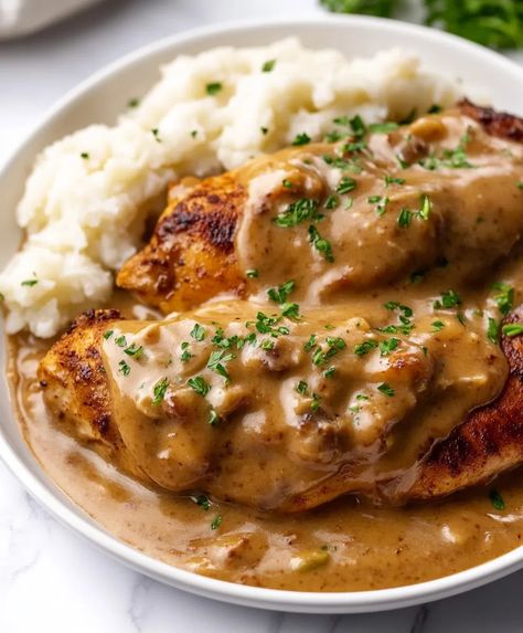 Smothered Chicken Recipe - Smothered Chicken Over Rice, Smothered Chicken Recipe, Chicken With Gravy, Smothered Chicken Recipes, Chicken Over Rice, Comforting Dinner, Chicken Tender, Smothered Chicken, Onion Gravy