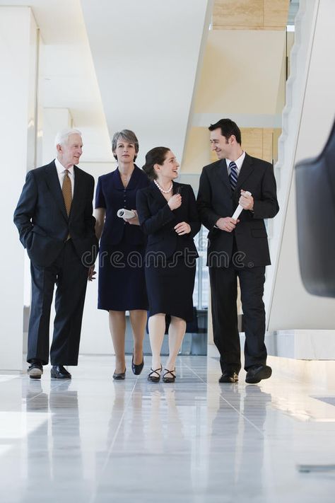 Front view of four executives walking in corridor. View of four businesspeople w , #sponsored, #executives, #walking, #Front, #view, #corridor #ad Walking Front View, Shoes Front View, Walking Poses, Female Office, Business Team, Print Design Fashion, Photography Jobs, Graphic Design Photography, Business People