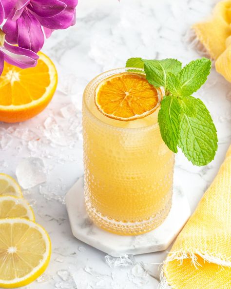 Dry July: Sweet and Spiced Orange Ginger Mocktail Citrus Mocktail, Orange Mocktail Recipes, Orange Mocktail, Dehydrated Citrus, Turmeric And Pepper, Easy Mocktails, Pour Decisions, Easy Mocktail Recipes, Virgin Drinks