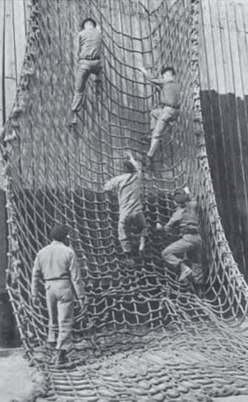 WWII 1940s fort benning army rangers cargo net Military Fitness, Backyard Gym, Church Games, Military Workout, Obstacle Course Races, Fort Benning, Obstacle Courses, Physical Training, American Ninja Warrior