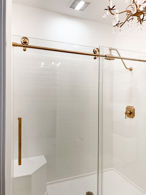 The Most Beautiful Shower Door Ever - Deb and Danelle Modern Sliding Shower Door, Shower French Door, Glass Shower Sliding Door, Glass Shower Door With Golden Trim, Gold Glass Shower Door, Master Shower Glass Door, Walk In Shower With Gold Fixtures, Slide Glass Shower Door, Bathroom With Sliding Shower Door