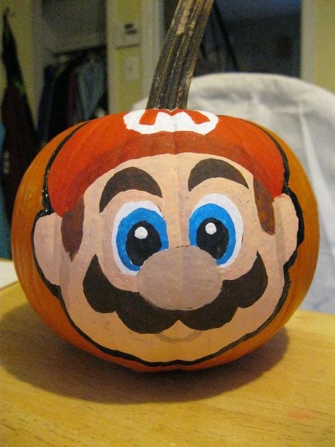 super mario pumpkin Mario Pumpkin Painting, Luigi Pumpkin, Mario Pumpkin, Story Book Pumpkin, Pumpkin Inspiration, Creative Pumpkin Painting, Character Pumpkins, Pumpkin Decorating Contest, Amazing Pumpkin Carving