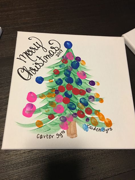 Fingerprint canvas art Christmas tree Fingerprint Canvas Art, Finger Print Art Ideas Christmas, Kids Christmas Fingerprint Art, Finger Print Christmas Tree, Finger Print Christmas Tree Ornament, Christmas Tree Fingerprint Craft, Christmas Fingerprint Art, Kids Fingerprint Wreath Ornament, Fingerprint Canvas