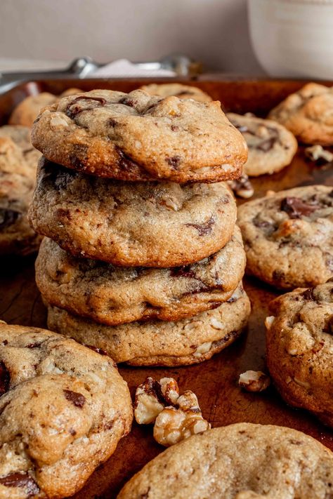 These thick and chewy chocolate chip walnut cookies have the perfect balance of sweet and salty! Loaded with melty chocolate and buttery walnuts, this easy cookie recipe is sure to become a family favorite! Chocolate Chip With Walnut Cookies, Choc Chip Walnut Cookies, Walnut And Chocolate Chip Cookies, Chocolate Chip Walnut Cookies Recipe, Chocolate Chip Cookies With Walnuts Recipes, Cinnamon Walnut Cookies, Chocolate Chunk Walnut Cookies, Oatmeal Walnut Chocolate Chip Cookies, Walnut Chocolate Chip Cookies