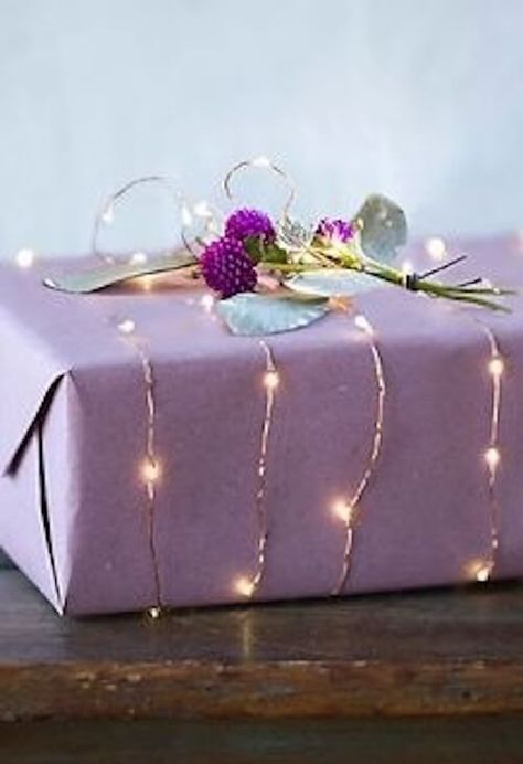 Wrap in battery operated lights and other great gift wrapping ideas! #giftwrapping #giftwrapideas Pretty Presents, Creative Wrapping, Wrapping Inspiration, Gift Wrapping Techniques, Gift Wrapping Inspiration, Wrapping Presents, Gift Wrap Ideas, Gifts Wrapping, Creative Gift Wrapping