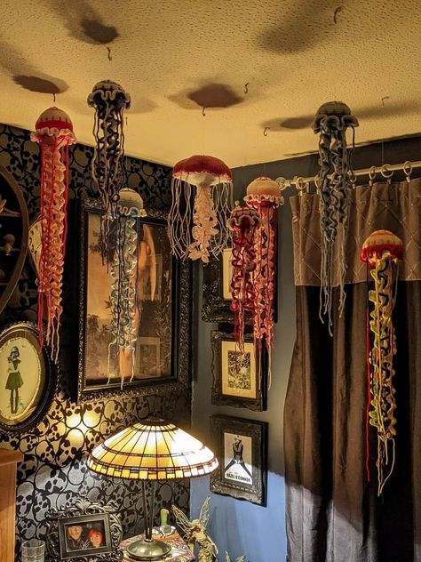 Whimsigoth Small Room, Posable Skeleton Ideas Inside, Crochet Jellyfish Room Decor, Diy Eclectic Wall Decor, Pirate Core Aesthetic Bedroom, Whimsical Ocean Bedroom, Ceiling Craft Ideas, Maximalist Ocean Decor, Chill Room Aesthetic Vintage