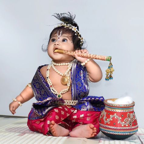 Baby in Krishna costume on krishnashtami Krishna Ashtami Baby Photoshoot, Krishna Getup For Babies, Krishna Jayanthi Baby Photoshoot, Kanha Baby Photoshoot, Gopika Dress For Kids, Krishnastami Baby Photoshoot, Radha Baby Photoshoot, Yashoda And Krishna Baby Photoshoot, Krishna Costume For Kids