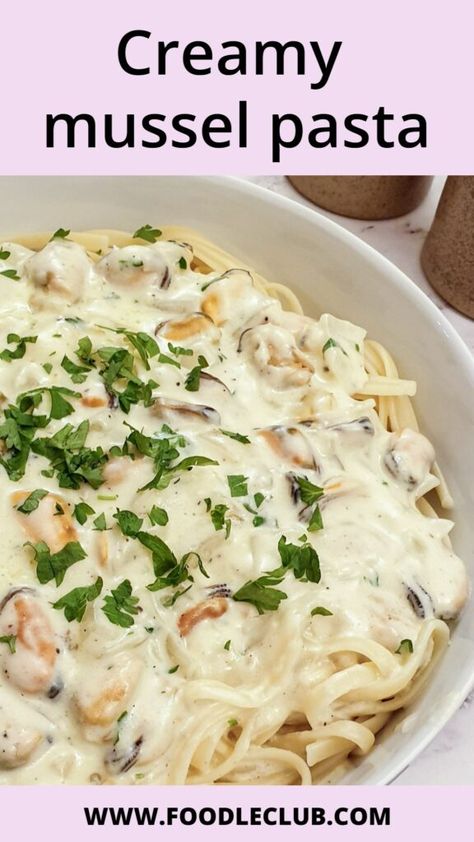 Close up of a dish of creamy mussel pasta sprinkled with parsley. Creamy Mussel Pasta, Mussel Pot Recipe Creamy, Muscles And Pasta, Recipes With Mussel Meat, Mussels And Pasta Recipes, Frozen Mussels Recipe Easy, Mussel Meat Recipe Frozen, Mussels In Cream Sauce, Recipes With Mussels