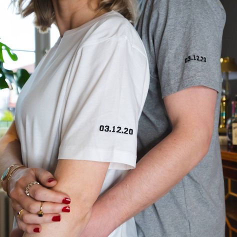 This Embroidered 'Sleeve Date' Couples Tshirt Set will make an memorable gift for a Wedding or special anniversary. The set includes 2 t-shirts: 1 x White and 1 x Grey Both tops feature the embroidered sleeve design that you can personalise to a date of your choice. Add a date that is special to you! Both t-shirts are unisex in style and are suitable for all genders. These tops have a relaxed fit - please see the size chart for more information Perfect for newlyweds! Available in White and Grery Embroidery Date Design, T Shirt Couple Design, Customised T Shirt, Tshirt For Boyfriend Gift Ideas, Wedding Tshirts Ideas, Couple Tshirt Design, Shirts For Boyfriend, Couple T Shirt Design, Tshirt Couple