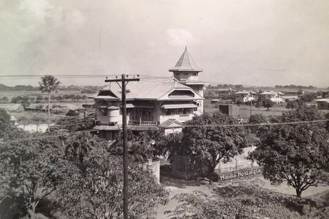 The ghosts of New Manila's Millionaire's Row and the spirits of 42 Broadway Avenue | ABS-CBN News New Manila, Millionaires Row, Air Raid Shelter, Abs Cbn, Air Raid, Wooden Staircases, Grand Staircase, Street Scenes, Black Dog