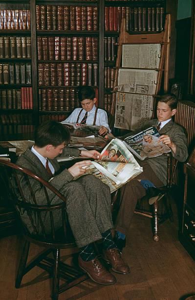 1940s Aesthetic Men, Boy Reading Aesthetic, British Private School Aesthetic, Boys Reading Books Aesthetic, Reading To Kids Aesthetic, Vintage School Aesthetic, Guy Reading Book, People In Library, Man In Library