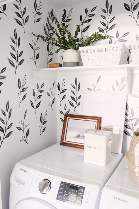 We love this small closet laundry room! Who says a small laundry room can't make a statement? The black & white wall decals tie the space together. Small Laundry Room - Home Decor - Farmhouse Laundry Room - Wall Paper Laundry Room Dream Laundry Room, Laundry Room Inspiration, Laundry Closet, Small Laundry Room, Laundry Mud Room, Laundry Room Makeover, Laundry Room Design, Laundry Room Decor, Décor Diy