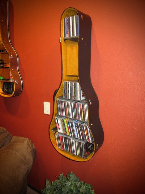 "Taste of Honey" This Guitar Case shelf is the Perfect Christmas Gift!!! To purchase one of my Guitar Case Shelves shown above, please visit my Etsy store at jimbosguitarshelves or my website at www.jimbosguitarshelves.weebly.com Thanks! Guitar Shelf, Music Furniture, Old Guitar, Home Music Rooms, Guitar Room, Guitar Ideas, Music Room Decor, Music Decor, Guitar Case