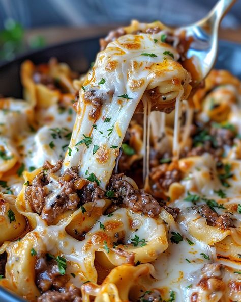 CHEESESTEAK TORTELLINI IN RICH PROVOLONE SAUCE 🧀🍝 Ingredients: 1 lb cheese tortellini 1 lb sirloin steak, thinly sliced Salt and pepper, to taste 2 tablespoons olive oil 1 onion, thinly sliced 1 green bell pepper, thinly sliced 1 red bell pepper, thinly sliced 1 cup beef broth 1 cup heavy cream 1 cup shredded provolone cheese 1/2 cup grated Parmesan cheese 1 teaspoon Italian seasoning Fresh parsley, chopped (for garnish, optional) Directions: Step 1: Cook the Tortellini Cook the cheese t... Steak Tortellini, Cheesesteak Tortellini, Tortellini Recipes, Sirloin Steak, Cheese Tortellini, Provolone Cheese, Beef Broth, Parmesan Cheese, Bell Pepper