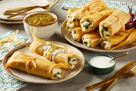 Green Chile & Oaxaca Tamales | Cacique® Inc. Green Chile Cheese Tamales, Chile And Cheese Tamales, Potato Tamales, Poblano Salsa, Hatch Chile Salsa, Cheese Tamales, First Of December, Corn Tamales, Cultural Foods