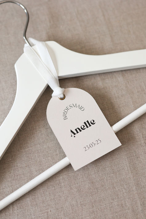 CUSTOM ARCHED HANGER TAGS FOR WEDDING DAY, PRINTED ARCH SHAPE NAME TAGS, SIMPLE & ELEGANT WEDDING PARTY, MODERN WEDDING HANGER TAGS, GIFT TAGS, ON THE DAY STATIONERY Personalise your or bridesmaid hangers with these simple wedding hanger tags giving a lovely finishing touch to your special day. Personalise it with names, date and bridal party role Diy Wedding Hangers Bridesmaid, Hanger Name Tags, Hanger Tags Wedding, Bridesmaid Hanger Tags, Wedding Hanger Ideas, Bridesmaid Wedding Day Gifts, Bridesmaid Hangers Diy, Wedding Puglia, Diy Wedding Hangers