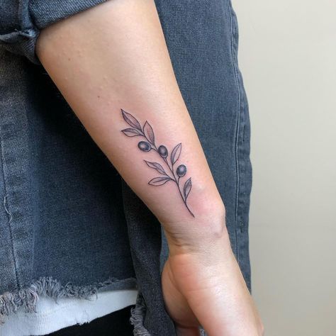 Forearm Olive Branch Tattoo, Green Olive Tattoo, Olive Branch Tattoo Forearm, Olive Branch Arm Tattoo, Olive Leaf Tattoo Design, Forearm Tattoo Placement, Dainty Wrist Tattoo, Olive Branch Tattoo Arm Wrap, Rosemary Tattoo